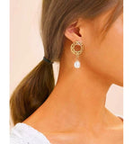 Shein- A pair of earrings made of circular faux pearls with a hollow cut by Bagallery Deals priced at #price# | Bagallery Deals